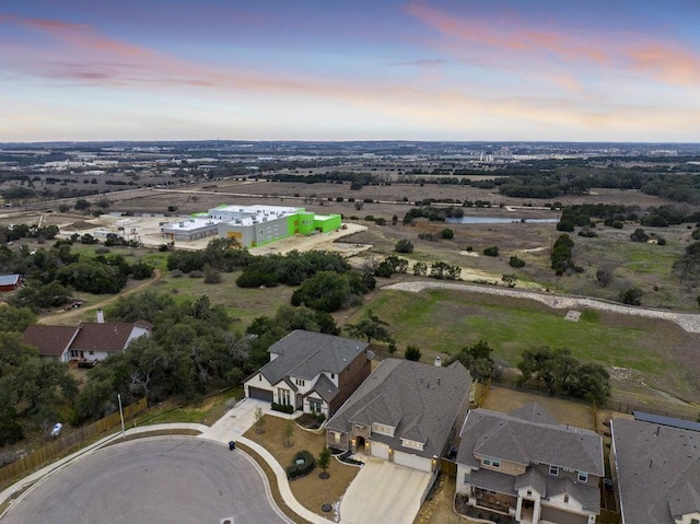 aerial view at dusk with a residential view