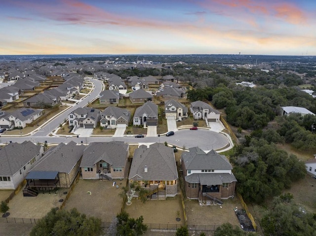 aerial view at dusk with a residential view