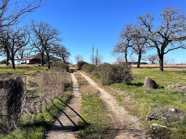 view of street featuring a rural view