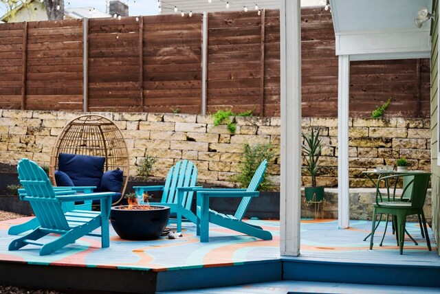 902 E Live Oak St, Austin, TX 78704 - view of patio featuring a fire pit