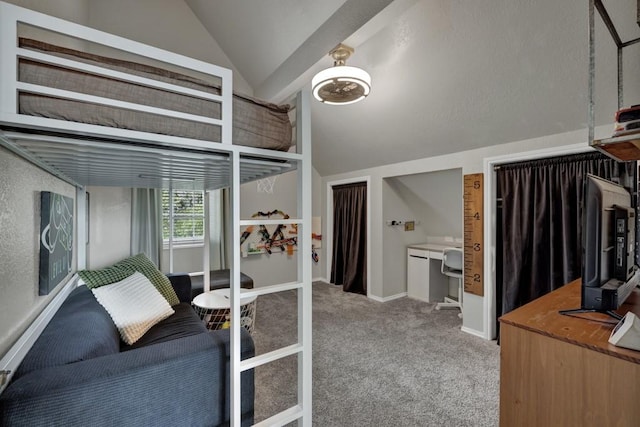 bedroom with light carpet, vaulted ceiling, and baseboards