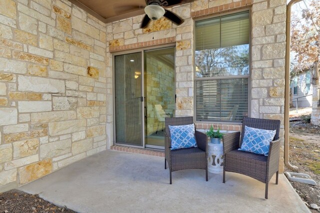 view of patio with ceiling fan