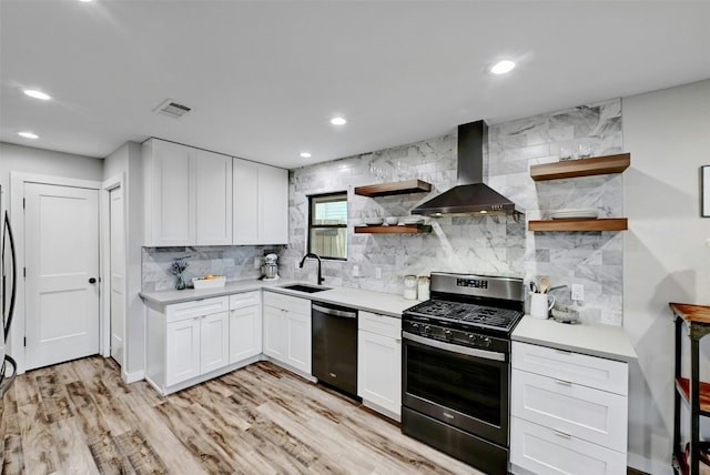 3010 Burleson Rd Unit A, Austin, TX 78741 - kitchen with stainless steel gas range oven, wall chimney range hood, open shelves, dishwasher, and decorative backsplash