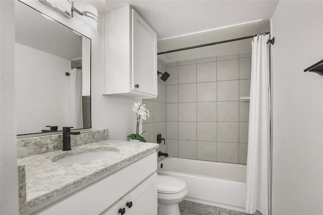 bathroom with shower / tub combo, vanity, and toilet