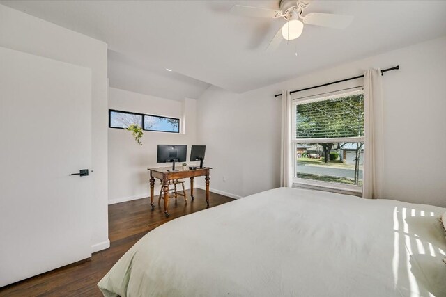 10104 Oak Hollow Cir, Austin, TX 78758 - bedroom featuring dark wood-style floors, a desk, baseboards, and lofted ceiling