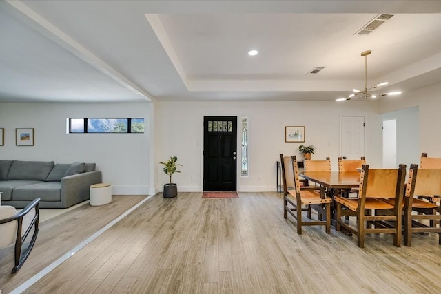 10104 Oak Hollow Cir, Austin, TX 78758 - dining area with light wood-style floors, a chandelier, healthy amount of natural light, and recessed lighting
