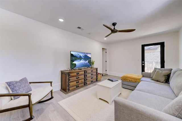 10104 Oak Hollow Cir, Austin, TX 78758 - living room with light wood-style floors, a ceiling fan, recessed lighting, and baseboards