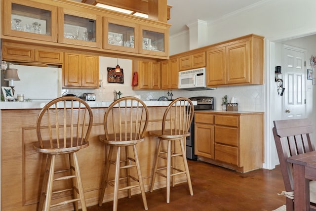 201 Hillview Cir, Dripping Springs, TX 78620 - kitchen featuring white appliances, light countertops, decorative backsplash, a kitchen breakfast bar, and crown molding