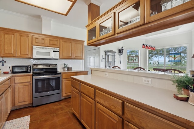 201 Hillview Cir, Dripping Springs, TX 78620 - kitchen featuring white microwave, electric stove, crown molding, light countertops, and tasteful backsplash