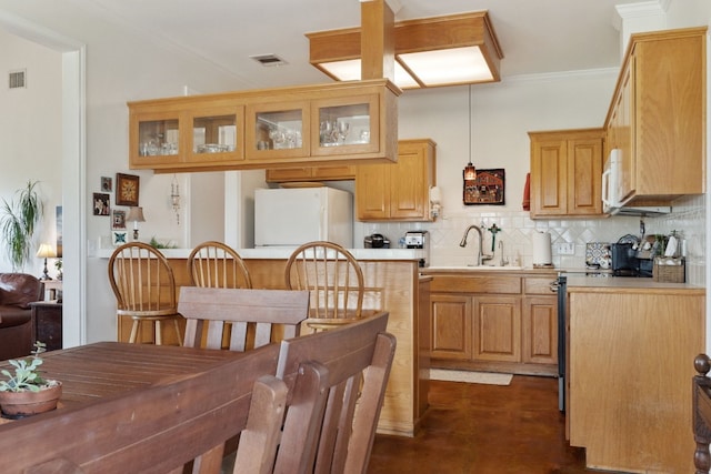 201 Hillview Cir, Dripping Springs, TX 78620 - kitchen featuring white appliances, decorative backsplash, glass insert cabinets, light countertops, and a sink