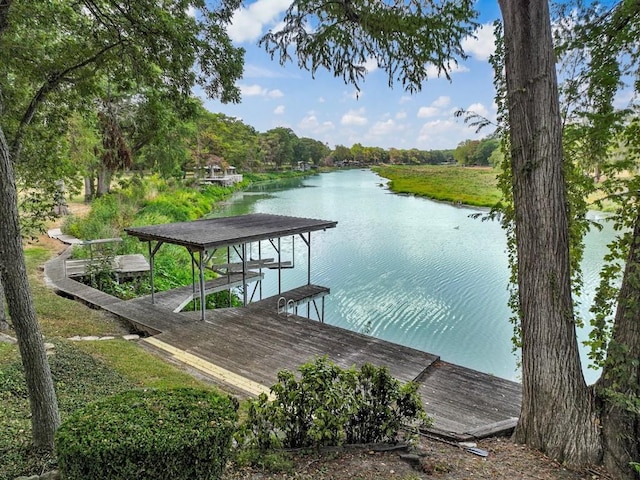 dock area with a water view