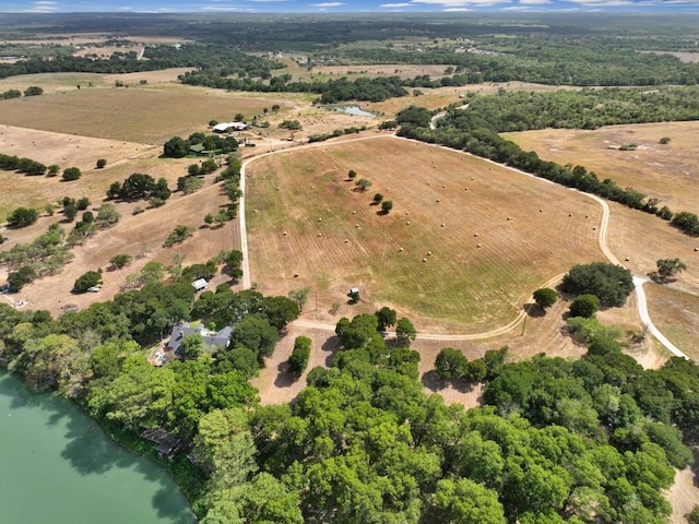 bird's eye view with a water view and a rural view