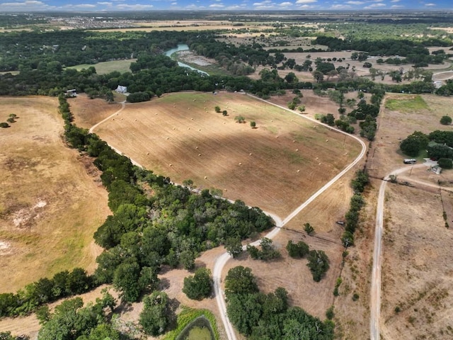 birds eye view of property featuring a rural view