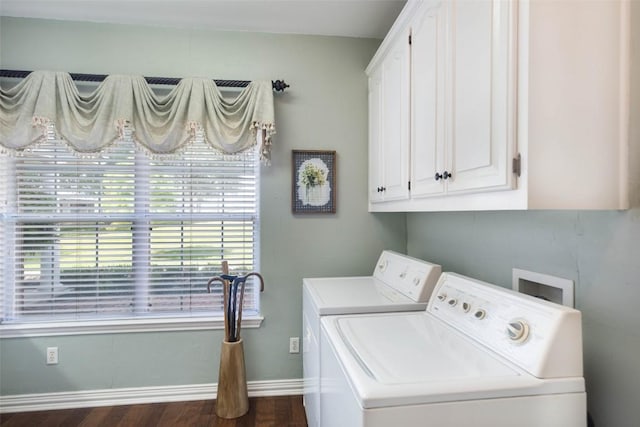 clothes washing area featuring cabinet space, baseboards, dark wood-style flooring, and independent washer and dryer