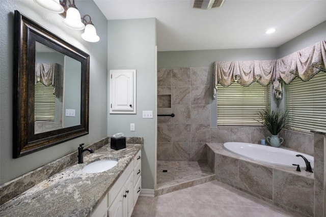 full bath featuring vanity, visible vents, tiled shower, a bath, and tile patterned floors