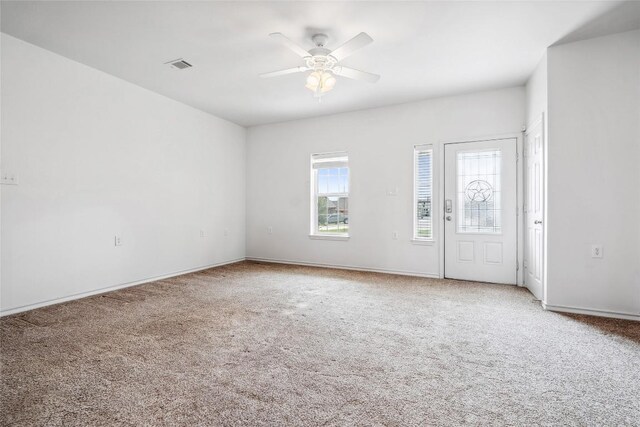 826 Savannah Cv, Elgin, TX 78621 - spare room with carpet floors, ceiling fan, and baseboards