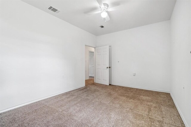 826 Savannah Cv, Elgin, TX 78621 - empty room with carpet, a ceiling fan, and baseboards