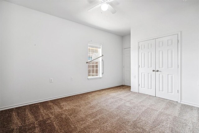 826 Savannah Cv, Elgin, TX 78621 - unfurnished bedroom with carpet, baseboards, ceiling fan, and a closet