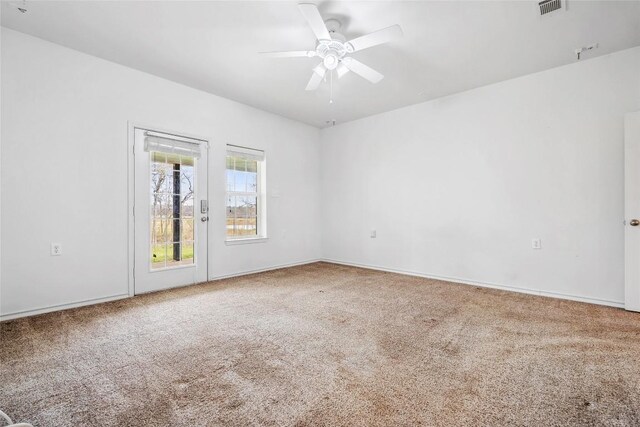826 Savannah Cv, Elgin, TX 78621 - carpeted spare room with ceiling fan and baseboards