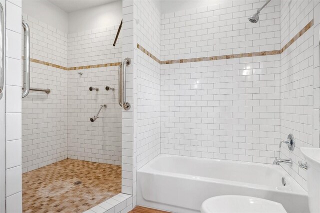 826 Savannah Cv, Elgin, TX 78621 - full bathroom featuring tiled shower / bath combo