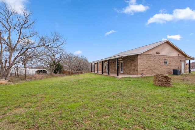 826 Savannah Cv, Elgin, TX 78621 - view of yard featuring central AC and a patio area