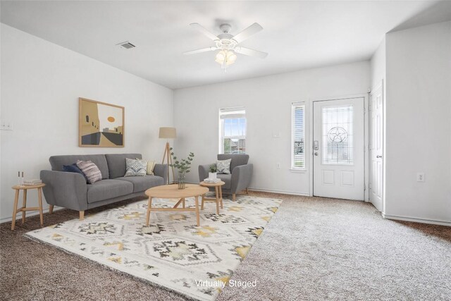 826 Savannah Cv, Elgin, TX 78621 - living area with carpet floors, ceiling fan, and baseboards