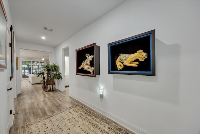 331 Kitty Hawk Rd, Georgetown, TX 78633 - corridor with wood finished floors and recessed lighting