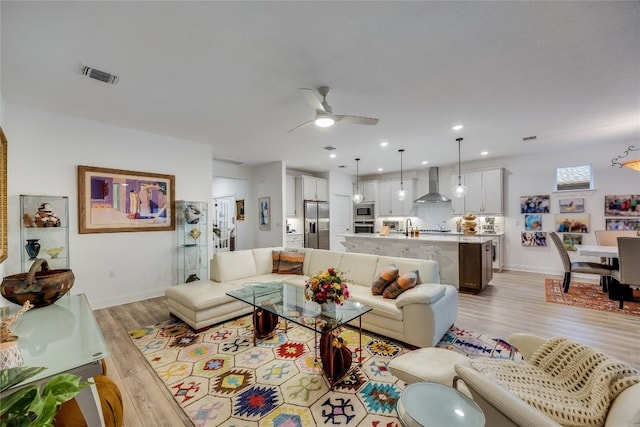 331 Kitty Hawk Rd, Georgetown, TX 78633 - living room featuring light wood-style floors, a ceiling fan, and recessed lighting