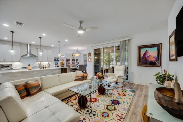 331 Kitty Hawk Rd, Georgetown, TX 78633 - living room featuring light wood-style floors, a ceiling fan, and recessed lighting