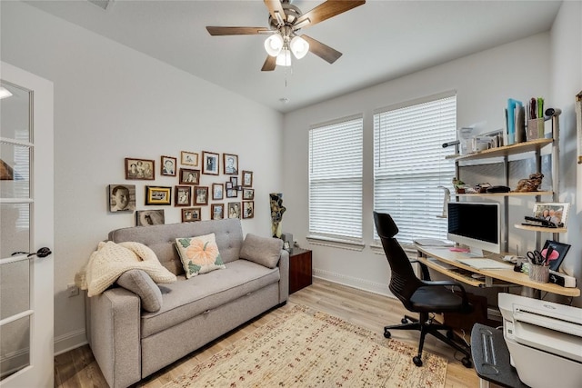 331 Kitty Hawk Rd, Georgetown, TX 78633 - office with light wood-style flooring and a ceiling fan