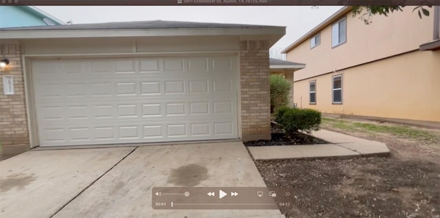 garage with driveway