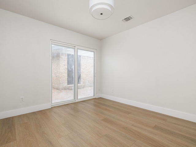 8205 Alabama Dr, Austin, TX 78745 - unfurnished room featuring light wood-type flooring and baseboards