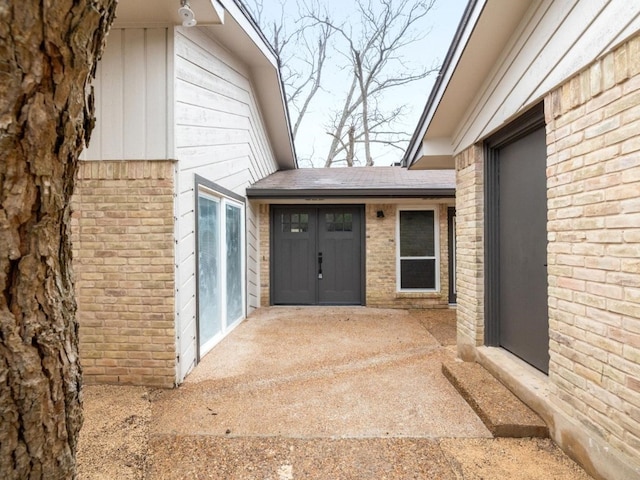 8205 Alabama Dr, Austin, TX 78745 - property entrance with brick siding