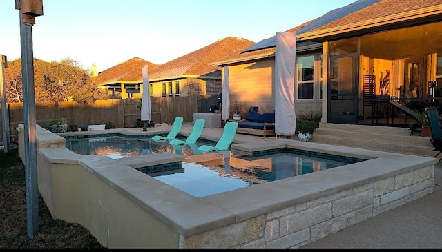 525 Scenic Bluff Dr, Georgetown, TX 78628 - view of pool with a fenced in pool, a fenced backyard, an in ground hot tub, and a sunroom