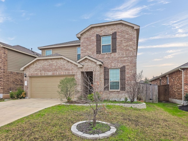 traditional home with driveway, brick siding, a front lawn, and an attached garage