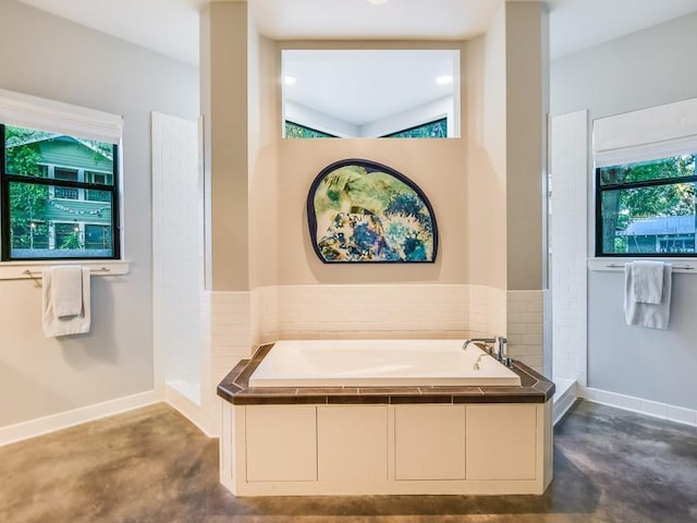 2312 W 8th St, Austin, TX 78703 - bathroom featuring concrete flooring and a bath