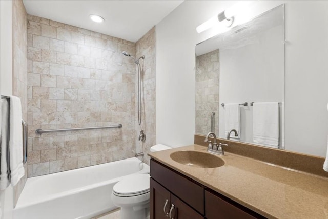 full bath featuring shower / tub combination, vanity, and toilet