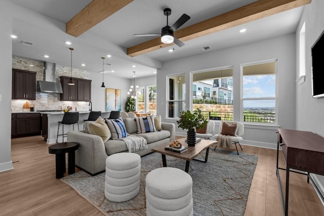 11 Doverland Dr, Lakeway, TX 78738 - living area featuring beam ceiling, light wood-style flooring, recessed lighting, ceiling fan, and baseboards