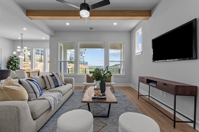 11 Doverland Dr, Lakeway, TX 78738 - living room featuring beamed ceiling, a chandelier, recessed lighting, wood finished floors, and ceiling fan