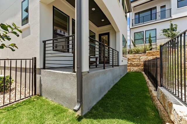 11 Doverland Dr, Lakeway, TX 78738 - view of home's exterior with stucco siding