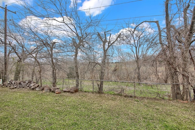 view of yard with fence