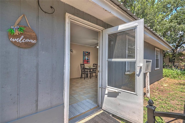 entrance to property with a patio area