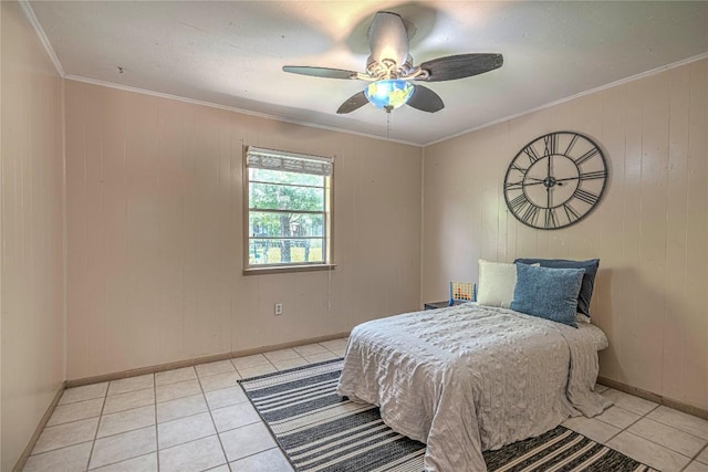 bedroom featuring light tile patterned floors, ceiling fan, ornamental molding, and baseboards