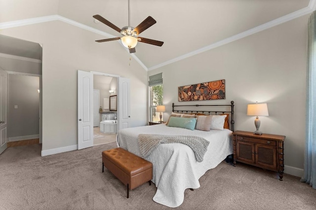 bedroom with high vaulted ceiling, light carpet, baseboards, ornamental molding, and ensuite bath