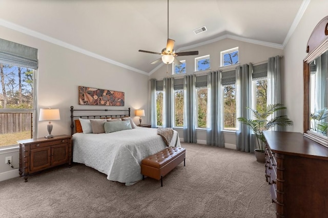 bedroom with light carpet, baseboards, visible vents, vaulted ceiling, and crown molding