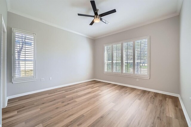 102 Blue Sky Ct, Georgetown, TX 78633 - spare room with plenty of natural light, light wood finished floors, a ceiling fan, and crown molding