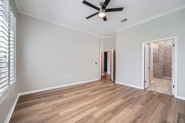 102 Blue Sky Ct, Georgetown, TX 78633 - unfurnished bedroom featuring light wood-style floors, ornamental molding, ensuite bathroom, and a ceiling fan