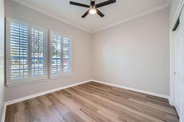 102 Blue Sky Ct, Georgetown, TX 78633 - unfurnished room with a ceiling fan, wood finished floors, and crown molding
