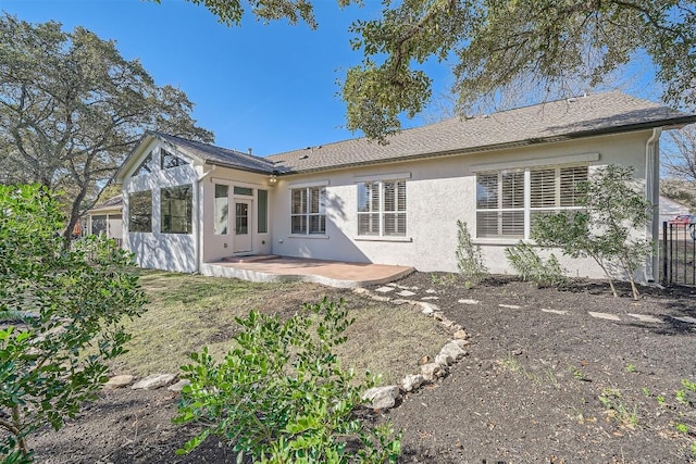 102 Blue Sky Ct, Georgetown, TX 78633 - back of house featuring stucco siding, a patio, and a sunroom