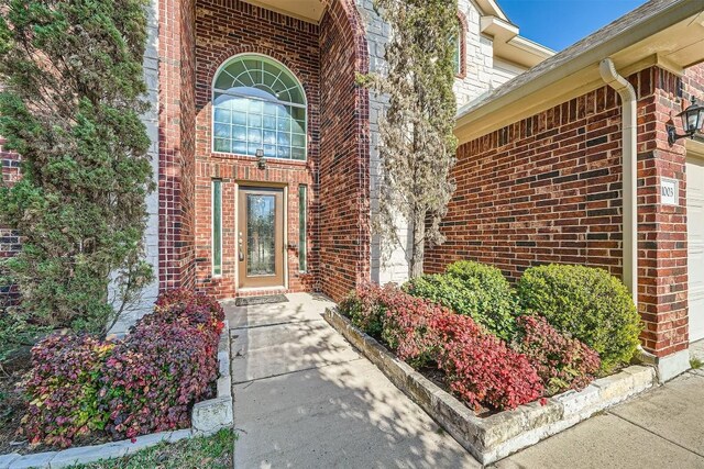 1003 Preserve Pl, Round Rock, TX 78665 - view of exterior entry featuring brick siding